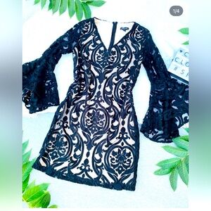 Classy sheer bell sleeves and a timeless V-neckline size S